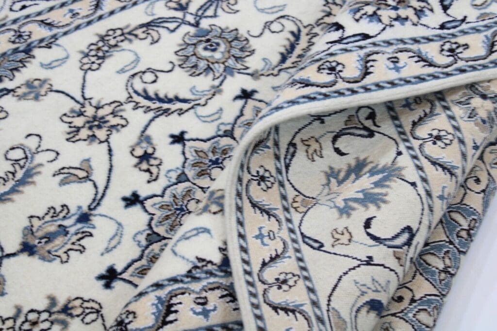 Persian Rug Nain 299 x 195 cm Wool Hand-knotted