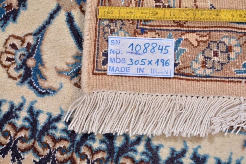 Persian Rug Nain 305 x 196 cm Wool Hand-knotted