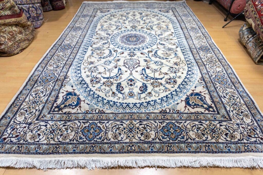 Persian Rug Nain 315 x 197 cm Wool Hand-knotted