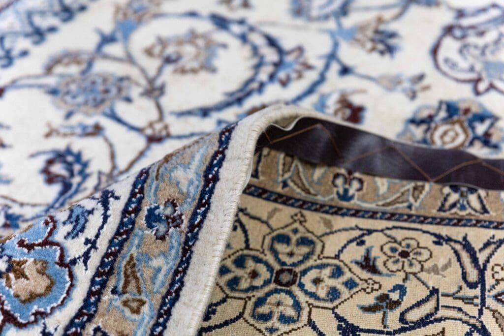 Persian Rug Nain 315 x 197 cm Wool Hand-knotted