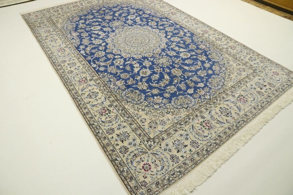 Persian Rug Nain 308 x 206 cm Wool Hand-knotted