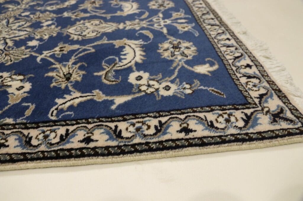 Persian Rug Nain 137 x 88 cm Wool Hand-knotted