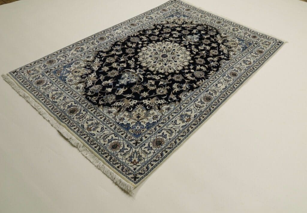 Persian Rug Nain 243 x 163 cm Wool Hand-knotted