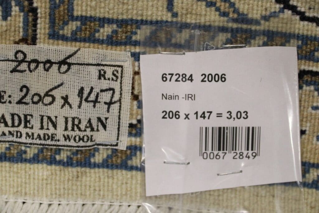 Persian Rug Nain 206 x 147 cm Wool Hand-knotted