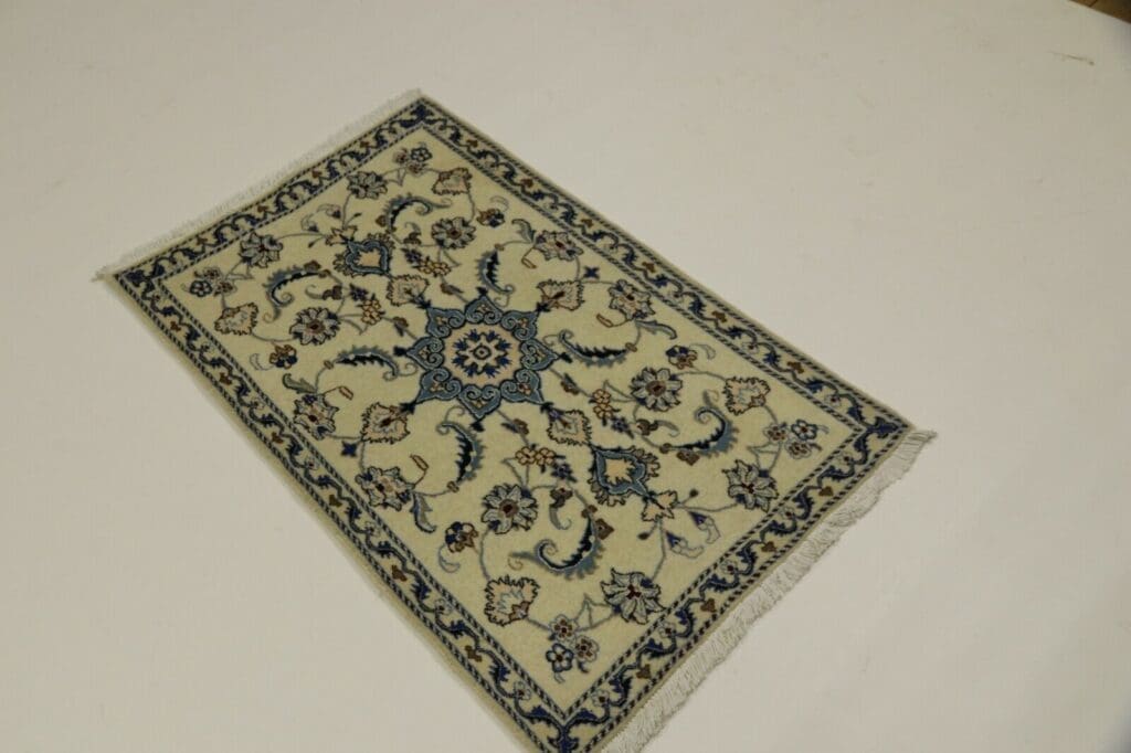 Persian Rug Nain 137 x 85 cm Wool Hand-knotted