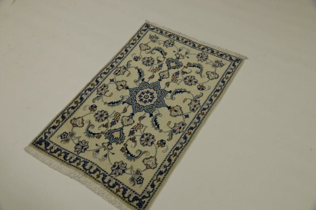Persian Rug Nain 137 x 85 cm Wool Hand-knotted