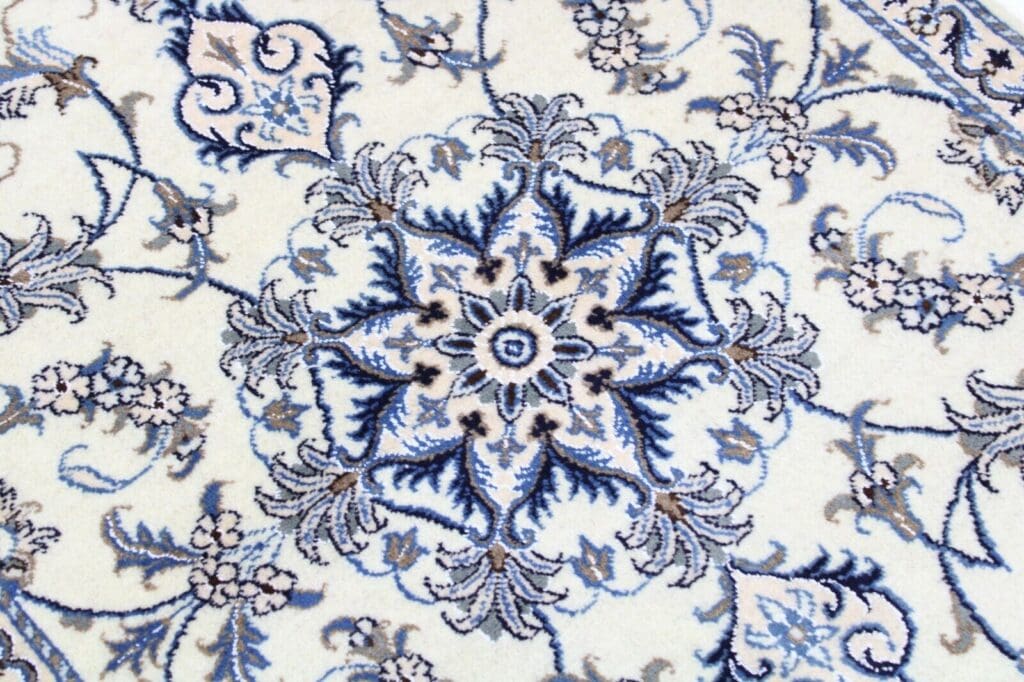 Persian Rug Nain 137 x 88 cm Wool Hand-knotted