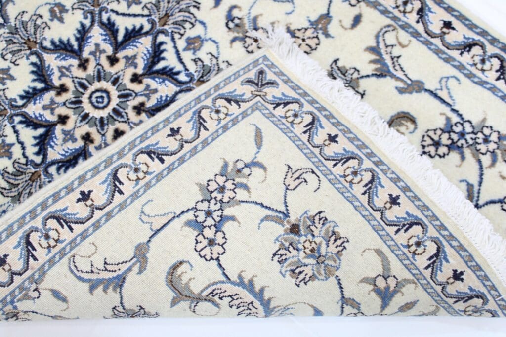 Persian Rug Nain 137 x 88 cm Wool Hand-knotted