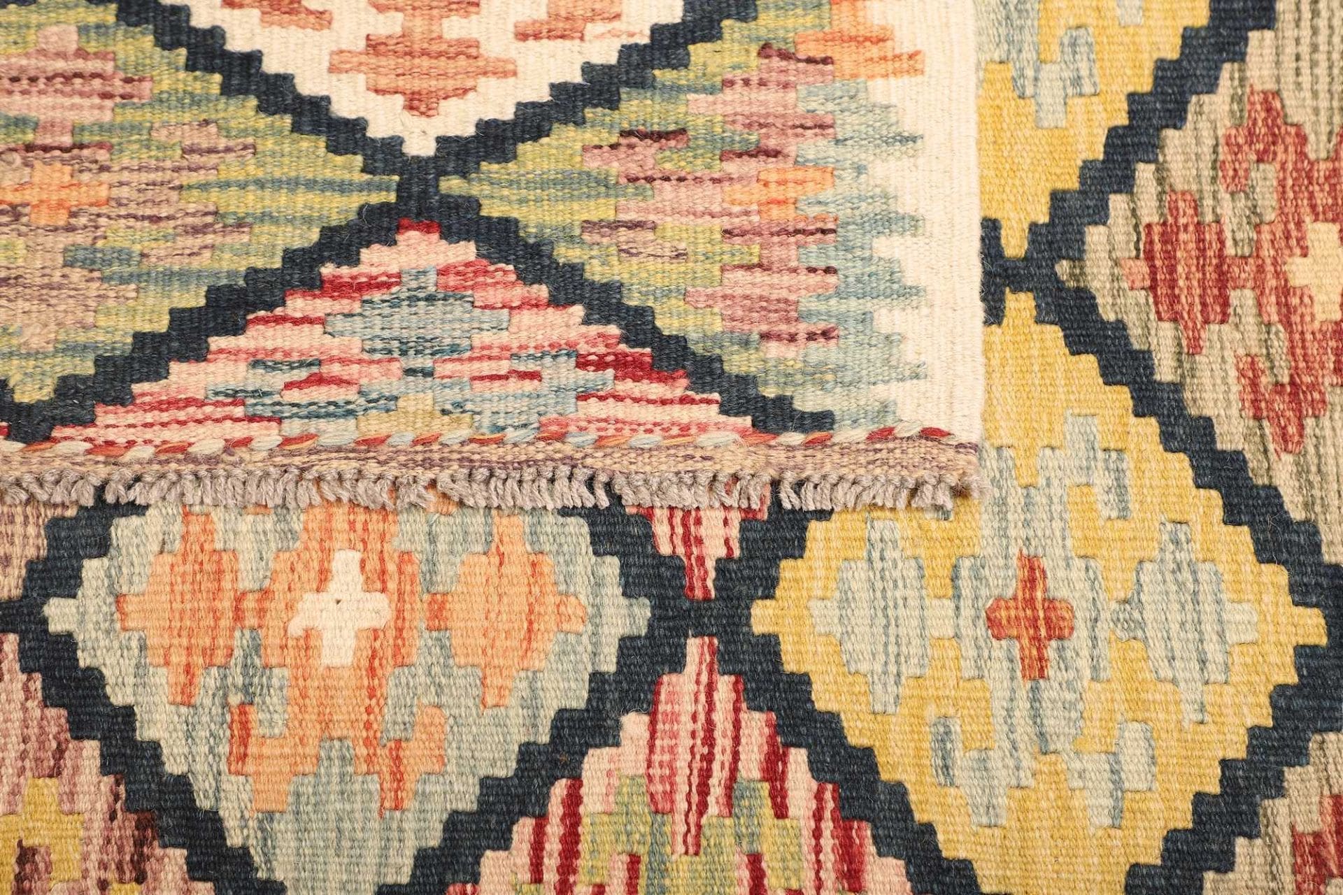 kelim-teppich-128-x-188-cm-handgewebt-rustikales-flair-wolle-4 Kilim Pakistani Rug — hand-woven, 128 × 188 cm, Wool