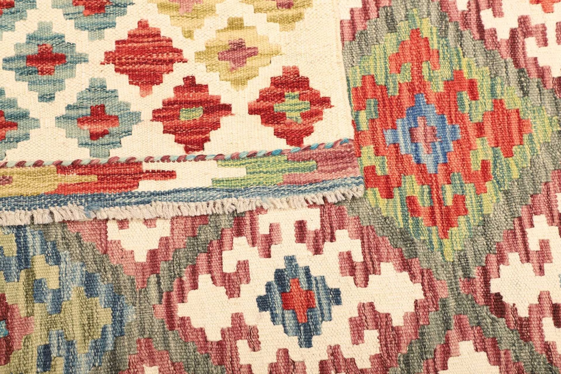 kelim-teppich-135-x-178-cm-rustikales-design-handgewebt-4 Hand-Woven Wool Kilim Pakistani Rug, 135 × 178 cm