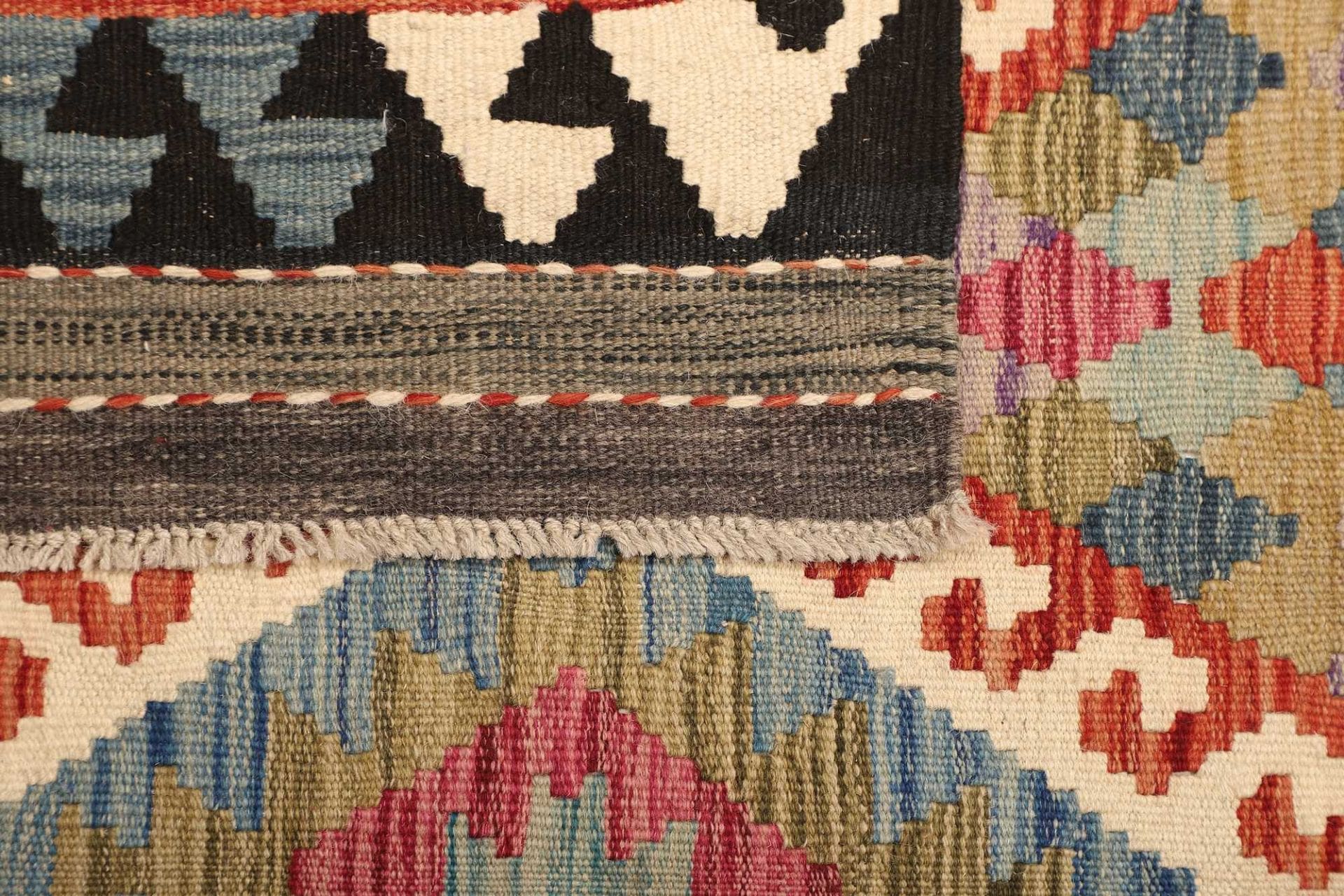 kelim-teppich-103-x-156-cm-handgewebt-rustikales-flair-wolle-4 Hand-Woven Wool Kilim Pakistani Rug, 103 × 156 cm