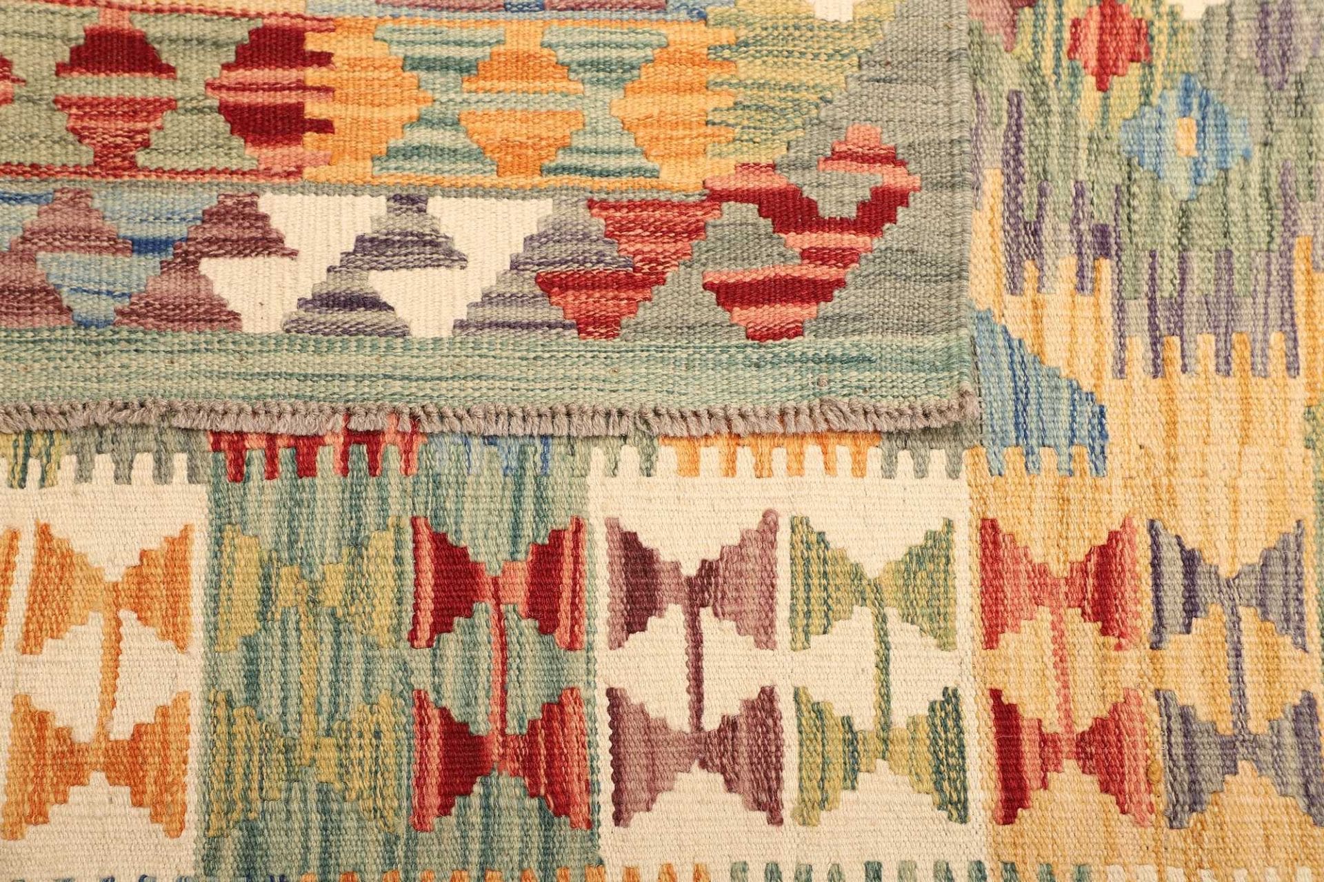 kelim-teppich-106-x-154-cm-handgewebt-rustikales-flair-4 Hand-Woven Wool Kilim Pakistani Rug, 106 × 154 cm
