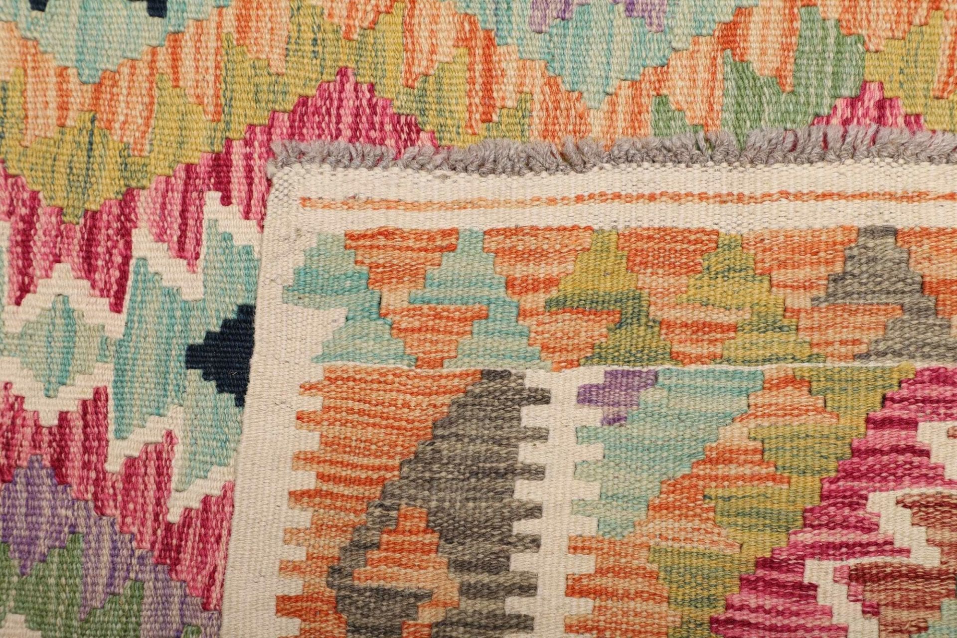kelim-teppich-104-x-200cm-handgewebt-schurwolle-rustikales-flair-4 Hand-Woven Wool Kilim Pakistani Rug, 104 × 200 cm